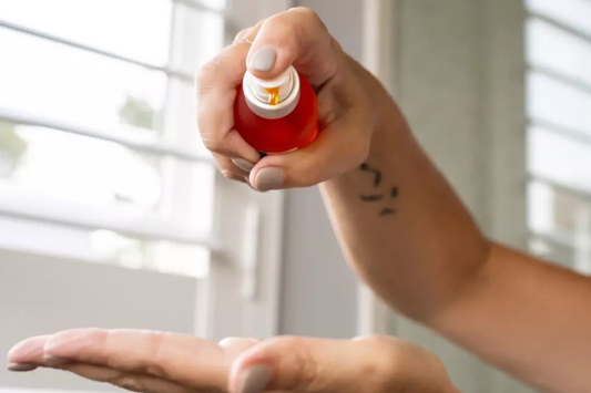Organic Oil Applied to Hands